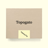 A chocolate gift box shown from the top down with San Francisco chocolate company Topogato logo.