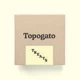 A chocolate gift box shown from the top down with San Francisco chocolate company Topogato logo.